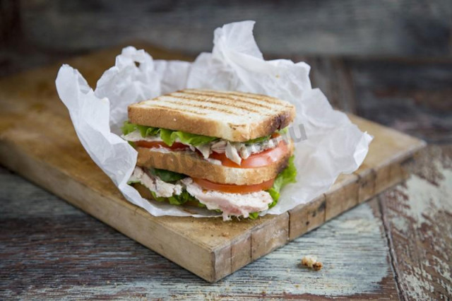 Sandwich with cucumber tomato chicken mayonnaise