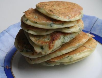 Zucchini pancakes, unsweetened on kefir with garlic and herbs