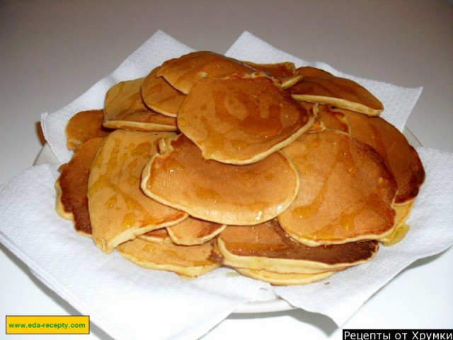 Apple pancakes with cinnamon in milk