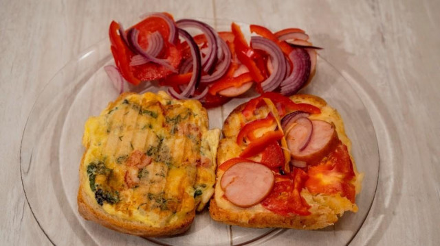 Closed pizza - omelet with cheese and semi-smoked sausage