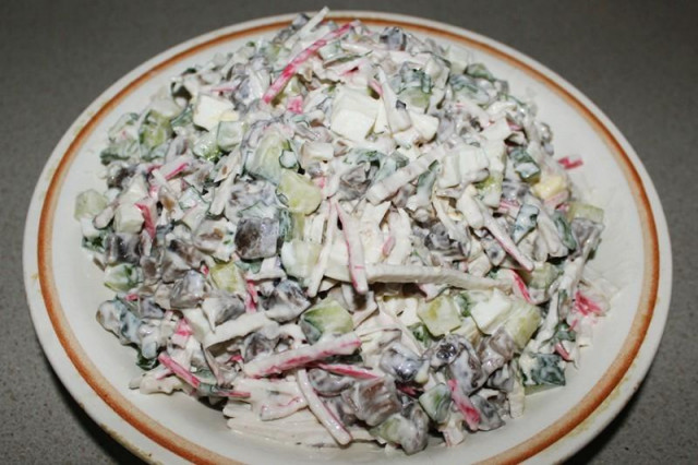 Salad with crab sticks, cucumbers and champignons