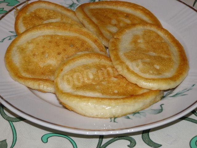 Fluffy pancakes on kefir and soda without eggs for breakfast