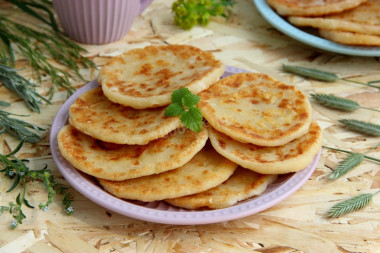 Flatbreads with cheese without yeast on kefir in a frying pan