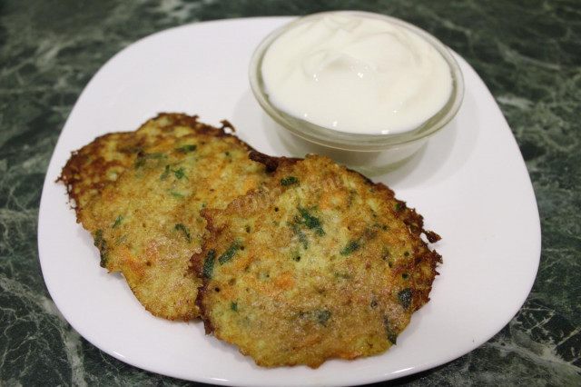 Zucchini pancakes with whole grain flour with sesame seeds