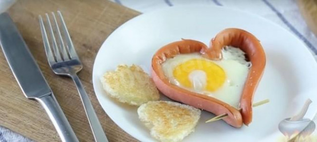 Breakfast for lovers of sausages with eggs