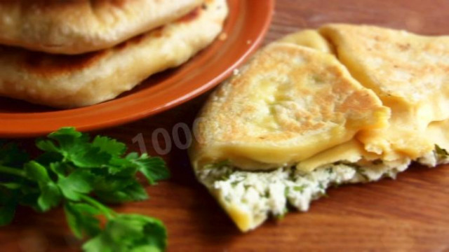 Layered tortillas with cottage cheese and herbs