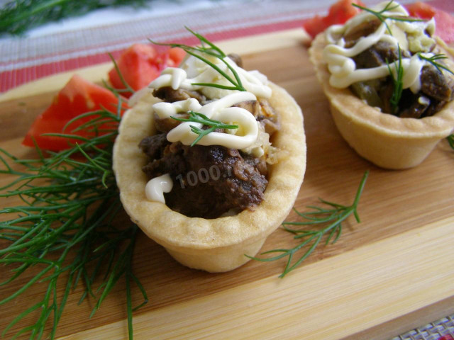 Belarusian salad with liver and mushrooms in tartlets