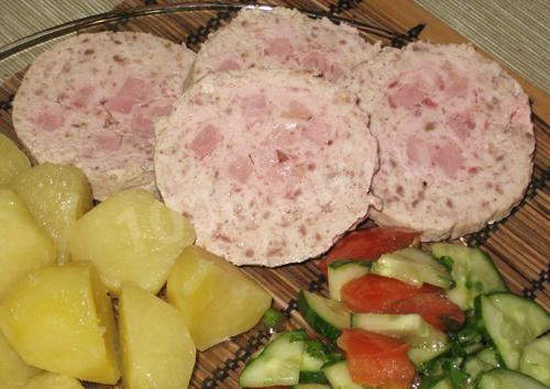 Boiled sausage with cream and ham