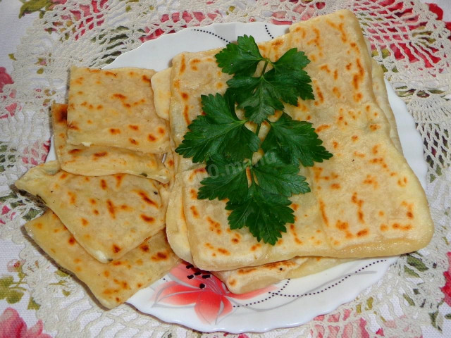Turkish gozleme tortillas on kefir with herbs