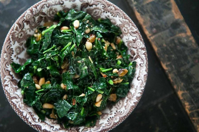 Side dish of chard with pine nuts and raisins
