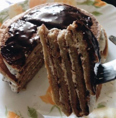 Pancake cake with bananas, chocolate and oatmeal