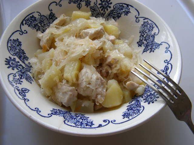 Stewed potatoes with meat and sauerkraut