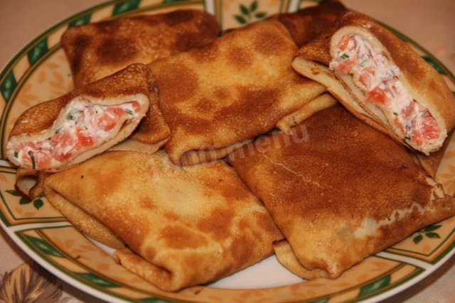 Pancakes with milk with red fish and cheese
