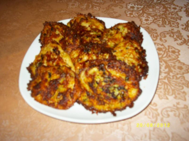 Potato and zucchini cutlets with hard cheese