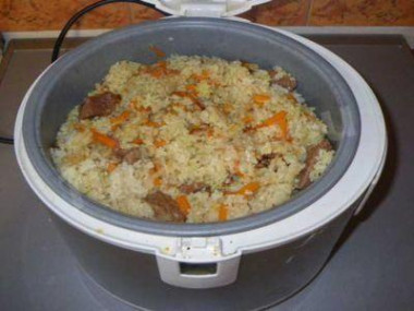 Pilaf pork with rice in a slow cooker