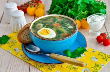 Nettle soup with egg, potatoes and chicken
