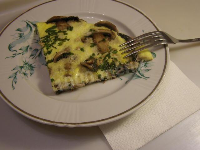 Omelet with pickled mushrooms and herbs