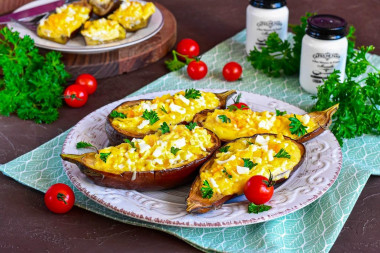 Eggplant baked with cheese and garlic in the oven