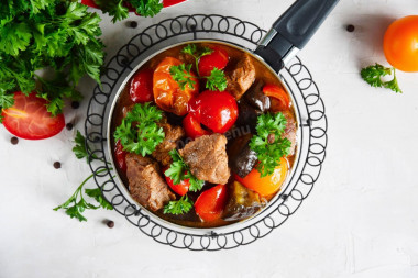 Beef with eggplant stewed tomatoes and peppers