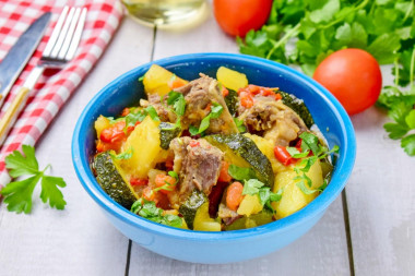 Lamb with vegetables in a cauldron stewed