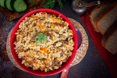 Pearl barley with stew in a slow cooker