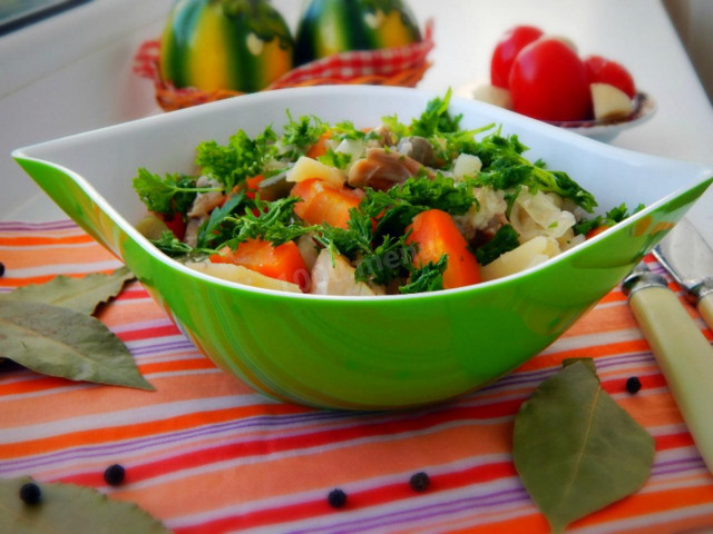 Stewed meat with vegetables in a slow cooker