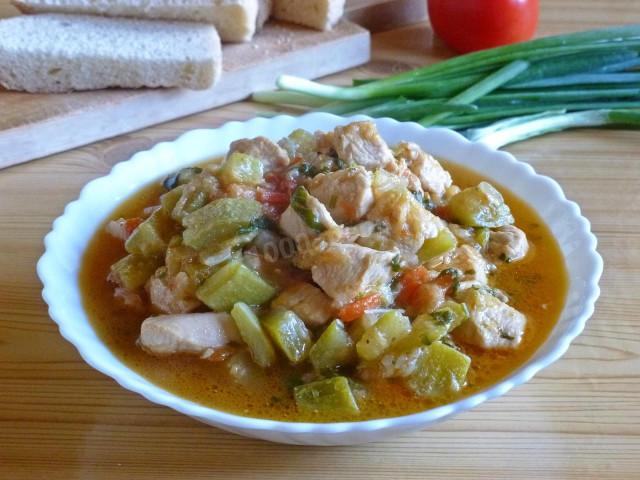 Chicken stewed with zucchini and saute tomatoes
