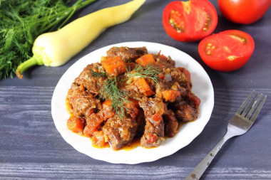 Beef stewed with vegetables in a slow cooker