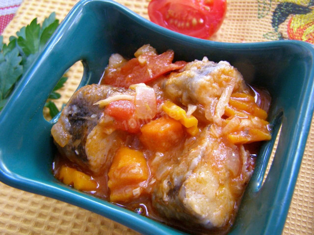 Stewed hake with celery and tomatoes