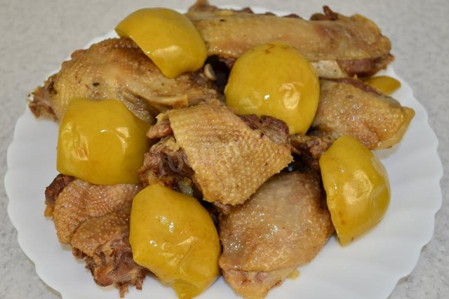 Duck stewed in a slow cooker with sour apples is simple and delicious