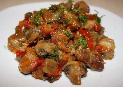 Stewed meat with champignons and sweet peppers