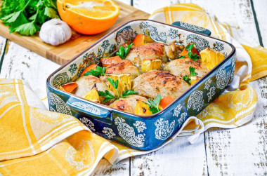 Chicken with oranges in the oven