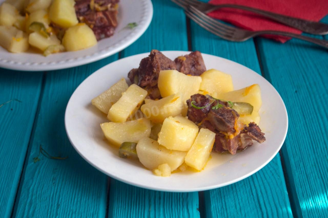 Smoked ribs with potatoes in a slow cooker