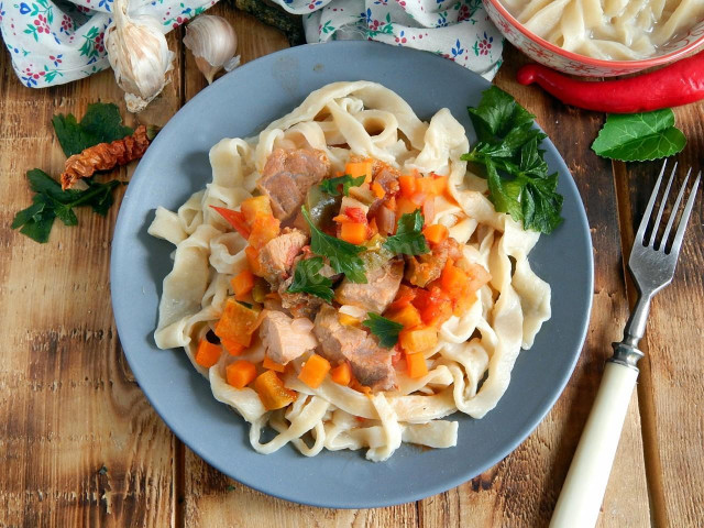 Lagman with pork and vegetables from homemade Uighur noodles