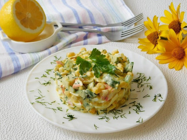 Salad with crab sticks cucumber and egg