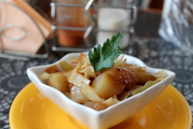 Stew with cabbage and potatoes in a slow cooker