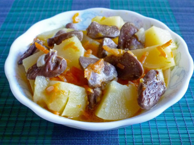 Chicken hearts with potatoes in a slow cooker