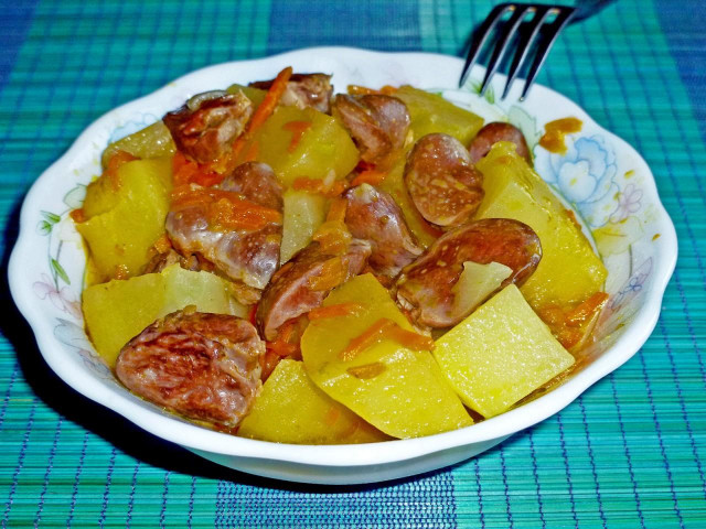 Chicken hearts with potatoes in a slow cooker