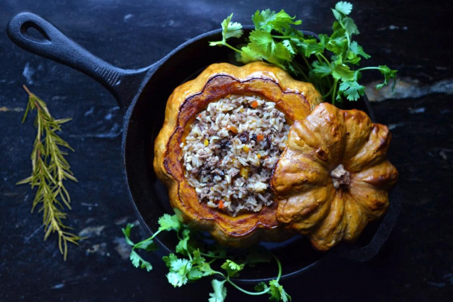 Baked pumpkin with rice in the oven