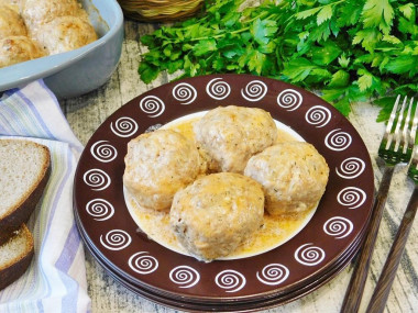 Meatballs in tomato sour cream sauce in the oven