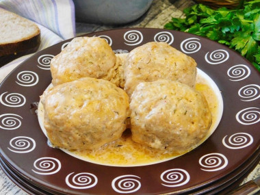 Meatballs in tomato sour cream sauce in the oven