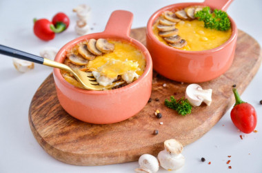 Julienne with chicken and mushrooms with cream in the oven