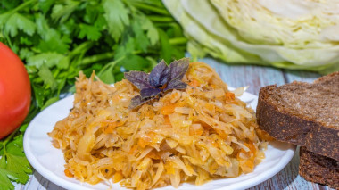 Stewed cabbage with tomato paste and carrots with onions