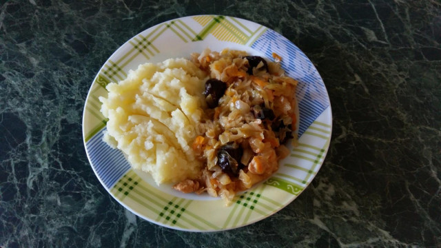 Stewed cabbage with chicken fillet, tomato paste, prunes