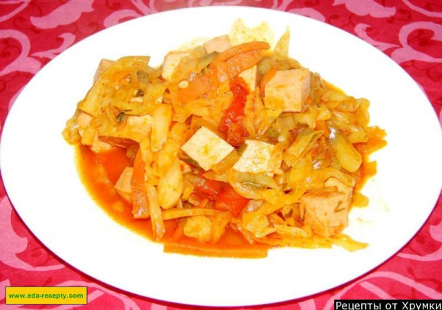 Cabbage with sausage and carrots stewed