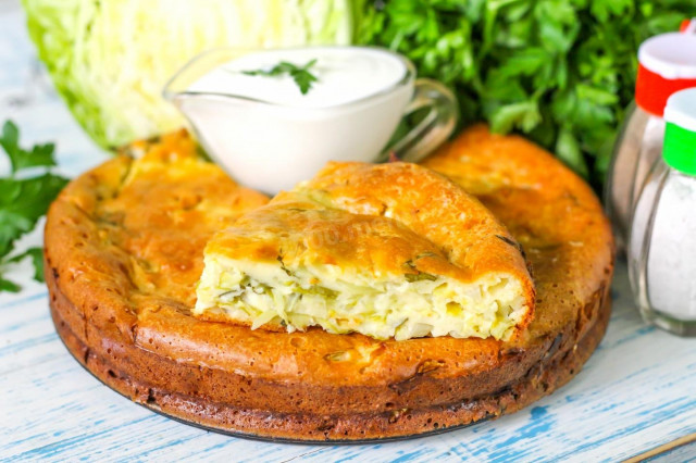 Aspic pie with cabbage on sour cream in the oven