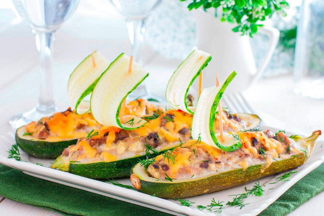 Zucchini boats in the oven with minced meat and mushrooms