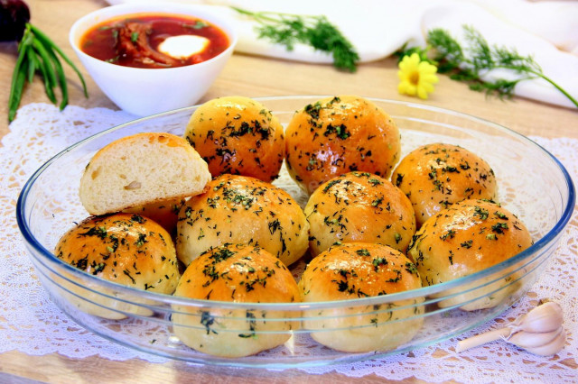 Ukrainian dumplings with garlic for borscht in the oven with yeast