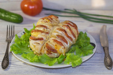 Chicken breasts with tomatoes and cheese in oven