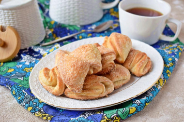 Cottage cheese cookies triangles with sugar in the oven